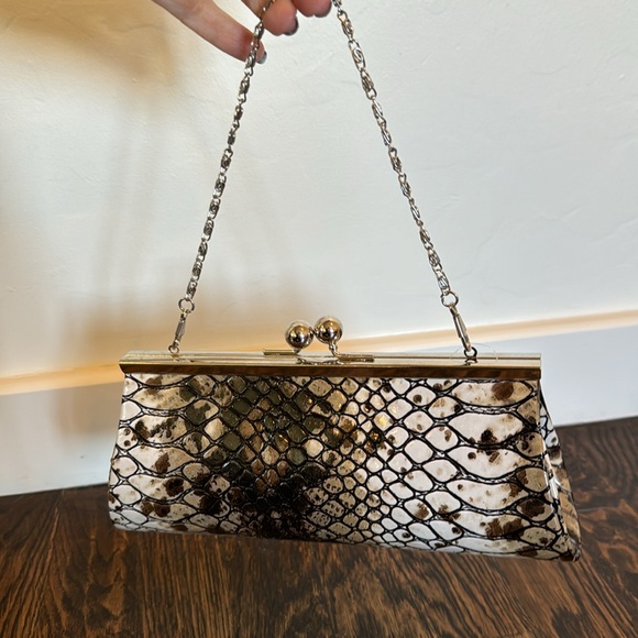 Brown/tan reptile-like print clutch w/ short silver chain. Never worn/like new. - Picture 3 of 3